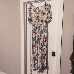 Open back cape romper